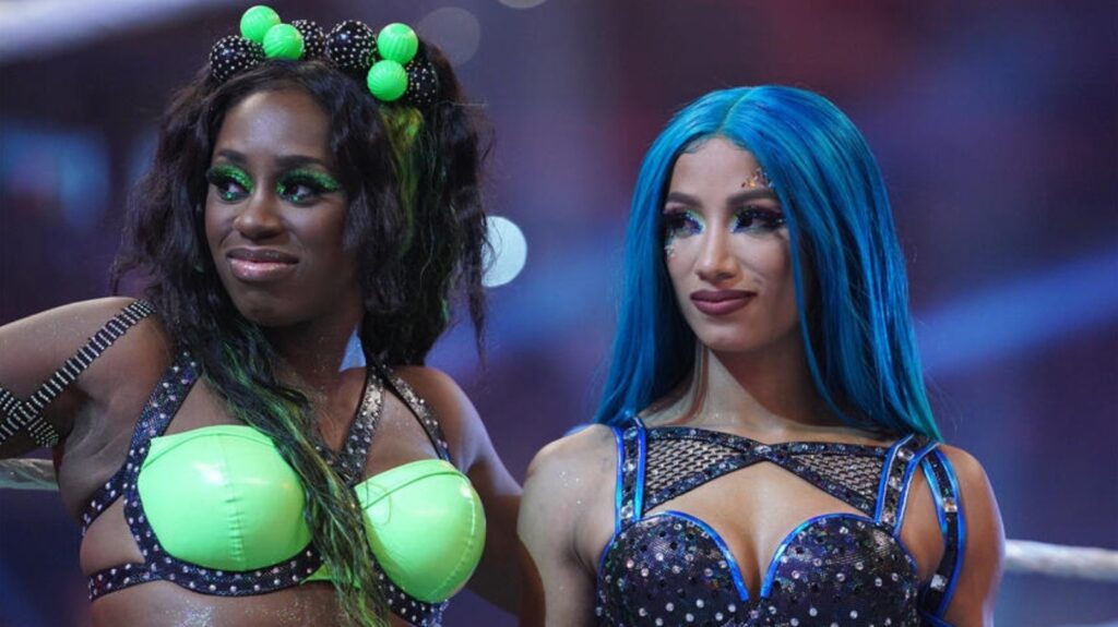 Mercedes mone celebrates naomi’s victory at wwe money in the