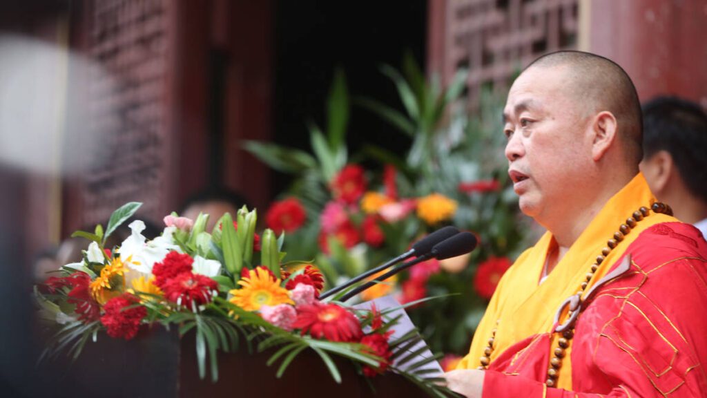 Buddhist monk faces scrutiny over financial misconduct and controversial connections