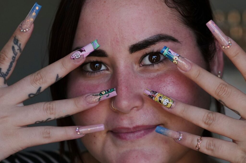 Cuban women shine with bold nail art amid economic challenges
