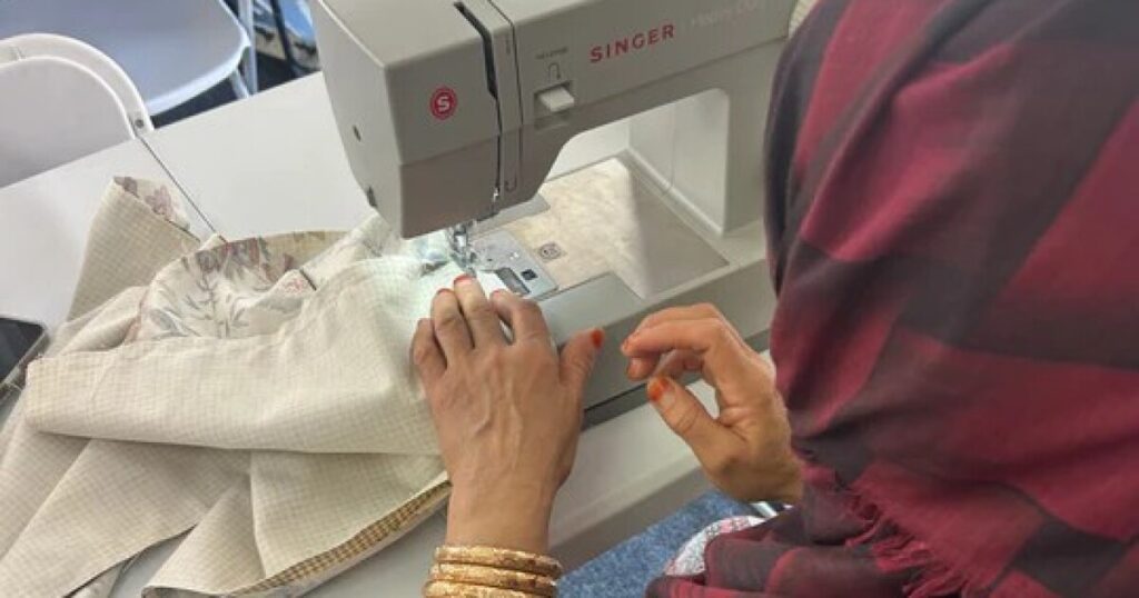 Empowering women through sewing, community, and income at shop refugee